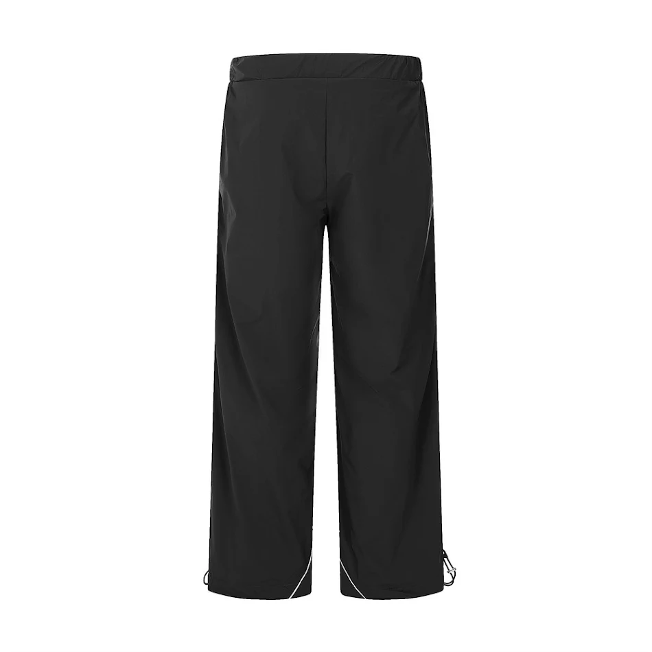 Pantalones deportivos casuales para hombre con pespuntes en la calle, comodidad y estilo para tu día a día, ideales para el deporte y el ocio.