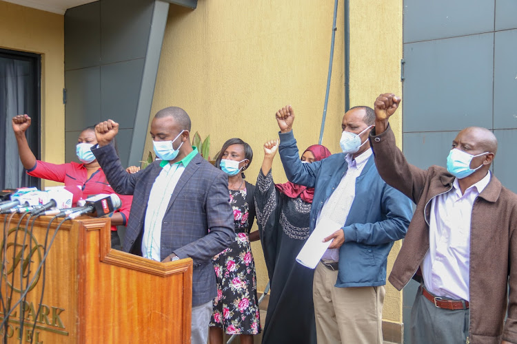 Health unions officials led by the Kenya Union of Clinical Officers chairperson Peterson Wachira at a Nairobi Hotel on October 28, 2020/ WILFRED NYANGARESI