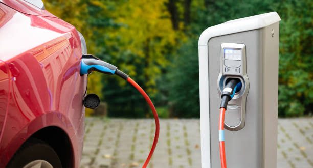 Charging a Red Electric car