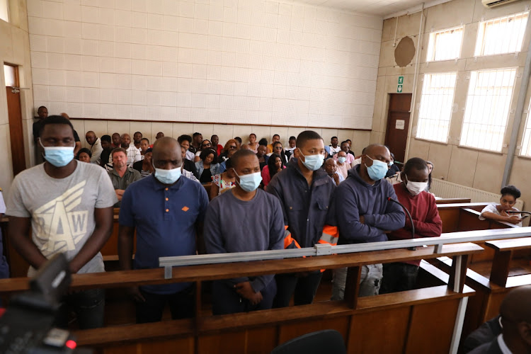Bethuel Ngobeni, Dumisa Moyo, Nhlanhla Magwaca, Moseki Sechele, Thabo Sechele and Khudzai Mashaya in court on Wednesday.