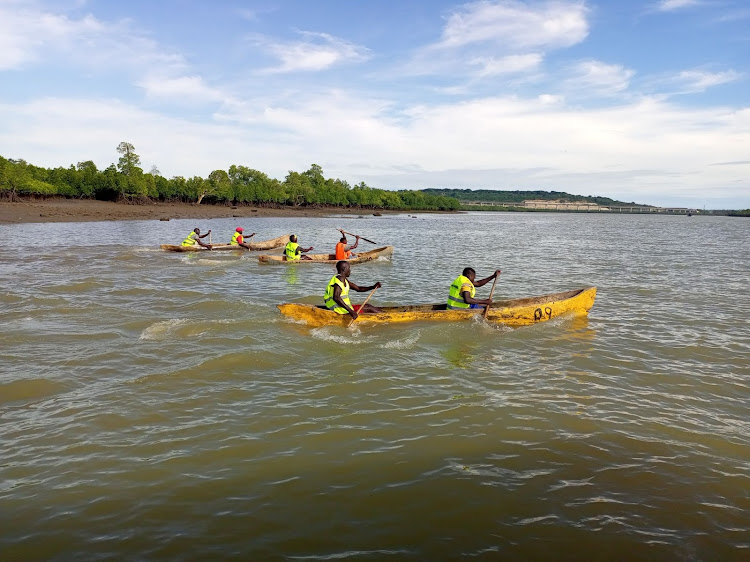 Competitors at the Jomvu annual boat racing competition at Mkupe creek in Jomvu on Sunday.