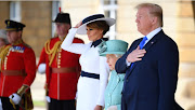 US first lady Melania Trump, Britain's Queen Elizabeth and US President Donald Trump during the ceremonial welcome at Buckingham Palace, London.