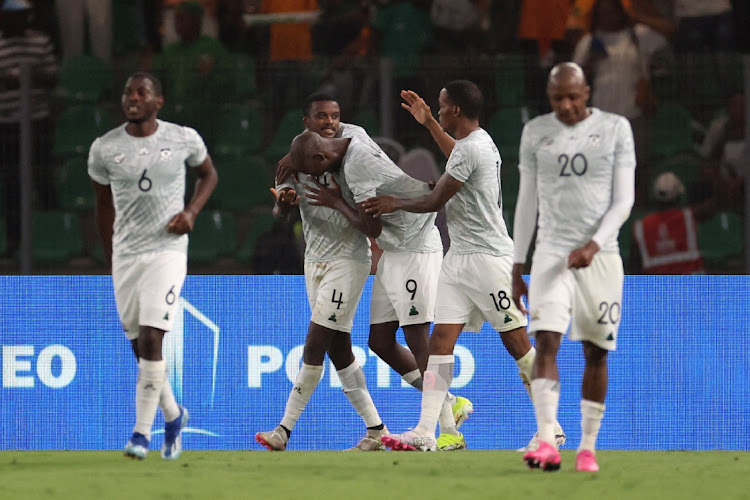 Teboho Mokoena celebrates scoring Bafana Bafana's equaliser from the penalty spot with Evidence Makgopa and other teammates in their Africa Cup of Nations semifinal against Nigeria at Stade de la Paix in Bouake, Ivory Coast, on Wednesday night.