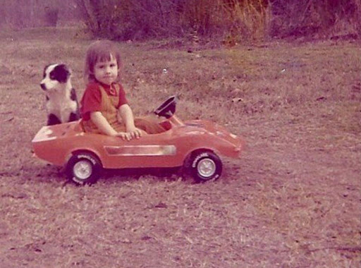 Krista in her red corvette