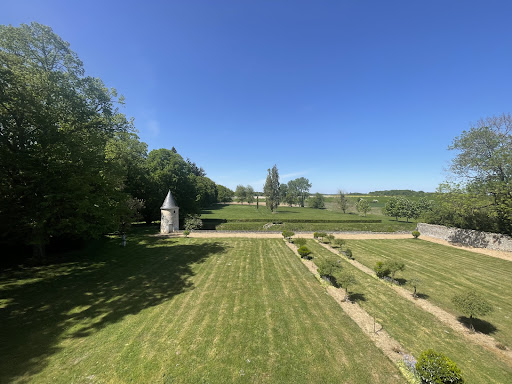 View of green landscaped garden in this luxury property for sale in Neuvy-le-Roi ($1,758,384 - 485 m²)