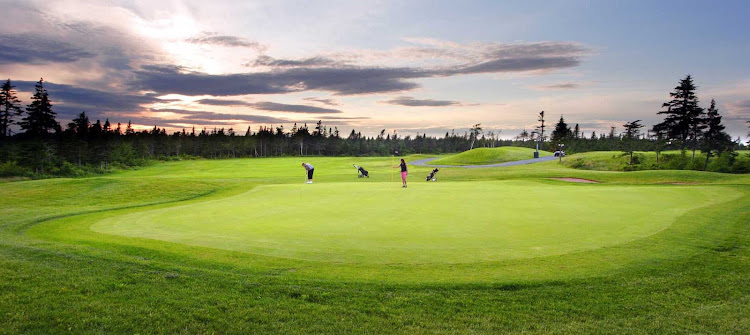 A scenic golf green on the coast of Avalon Peninsula in Newfoundland. 