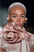 Model Adwoa Aboah in blush Marc Jacobs.