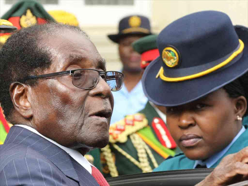 President Robert Mugabe leaves after delivering his State Of the Nation address at Parliament in Harare, Zimbabwe, December 6, 2016. /REUTERS