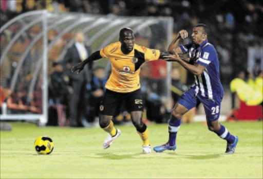 LITTLE ROOM: Kaizer Chiefs' Siphelele Mthembu is closely watched by Maritzburg United's Deolin Mekoa during their Absa Premiership match at Harry Gwala Stadium last night. United won 1-0, handing Chiefs only their second loss Photo: THULI DLAMINI