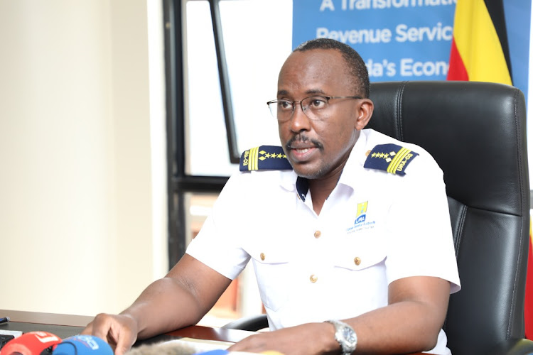 URA Commissioner General John Musinguzi Rujoki briefing Journalists in Kampala