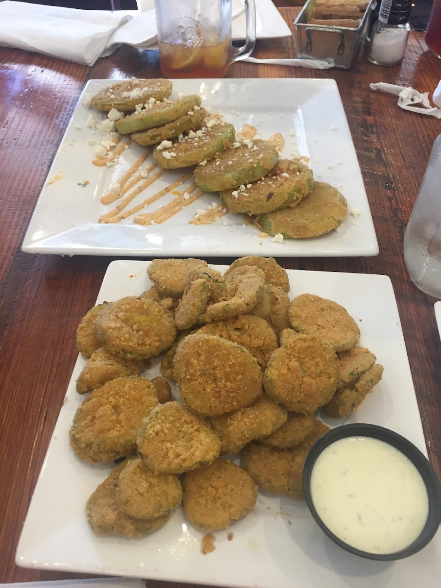 Fried green tomatoes and fried pickles. Suggest ordering the tomatoes without the fancy sauce if one is allergic to dairy.