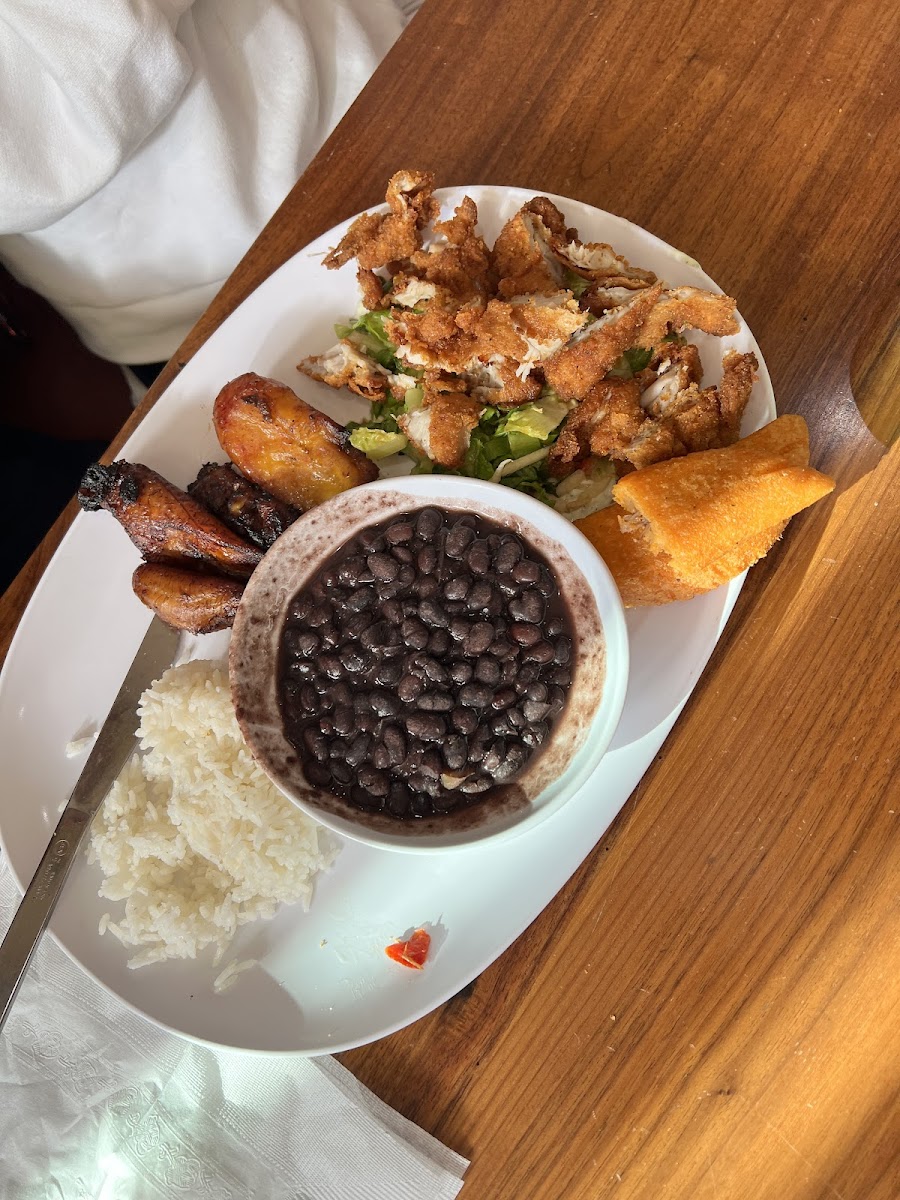 Crispy chicken with rice/beans and added a beef empanada order