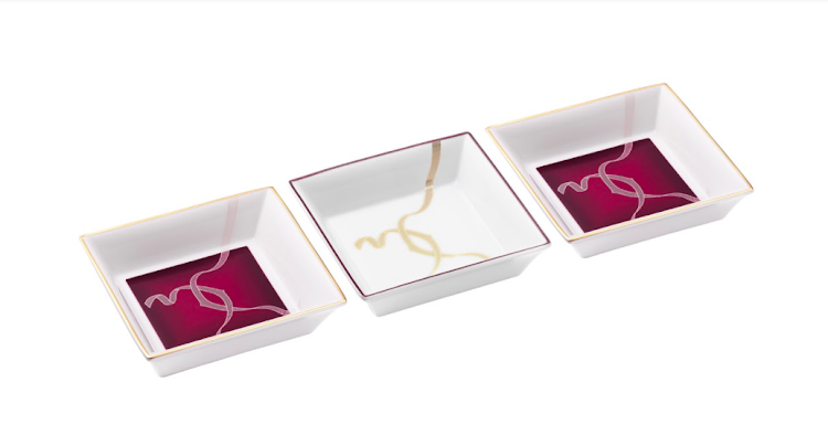 Set of three Entrelacés de Cartier trinket trays.