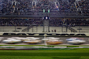 Nascar officials postponed the Daytona 500 to Monday due to rain at Daytona International Speedway.

