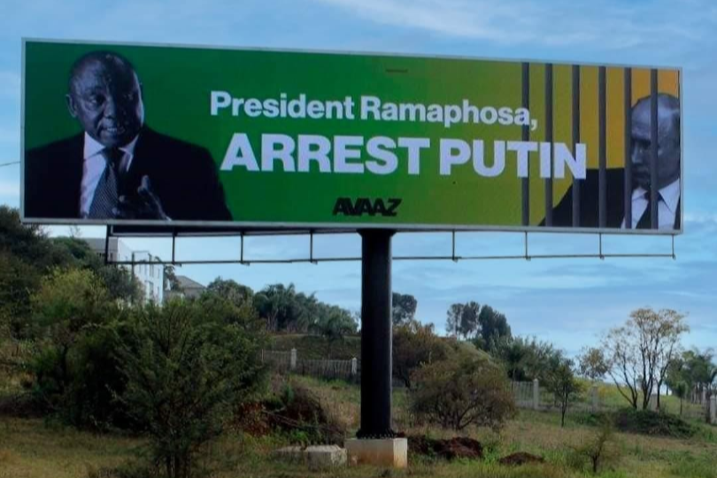 A billboard calling for the arrest of Russian President Vladimir Putin has caused controversy.