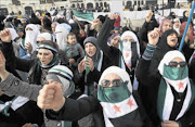 ENOUGH:
        Syrians living in Jordan shout slogans during a demonstration against Syrian President Bashar al-Assad after Friday prayers in front of the Syrian Embassy in Amman last week. 
      PHOTO: REUTERS