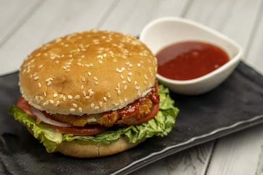 Schezwan Aloo Tikki Burger