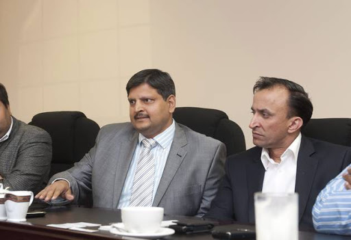 Indian businessmen, Ajay Gupta (L) and younger brother Atul Gupta, Oakbay (C) MD Jagdish Parekh (R) with Sahara director, Duduzane Zuma (Far Right). File photo