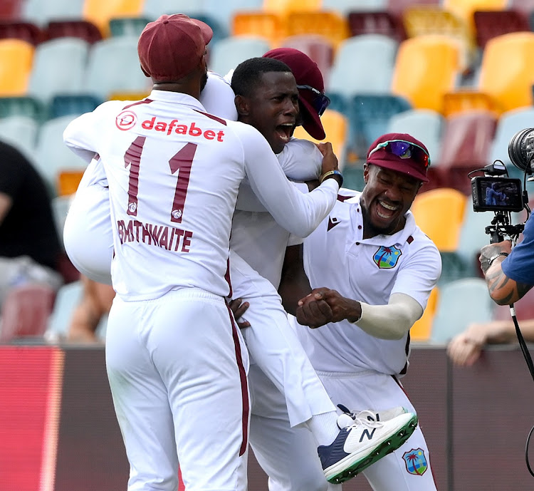 Shamar Joseph of the West Indies celebrates victory after taking the wicket of Josh Hazlewood of Australia on day four of the second Test at the Gabba in Brisbane on Sunday.