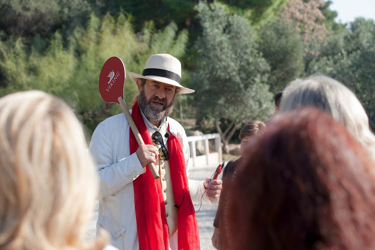 A Viking Star tour guide leads a shore excursion at the Acropolis in Athens. 