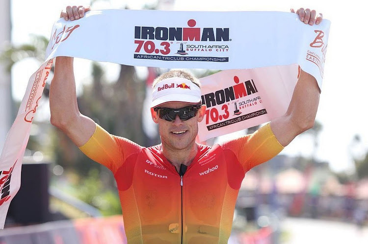 Matt Trautman celebrates winning the Ironman Buffalo City 70.3 in East London.