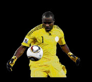 Nigeria's goalkeeper Vincent Enyeama commits a foul on South Korea's Park Ji-sung to receive a yellow card during the 2010 World Cup Group B soccer match at Moses Mabhida stadium in Durban June 22, 2010. REUTERS/Paul Hanna (SOUTH AFRICA  - Tags: SPORT SOCCER WORLD CUP)