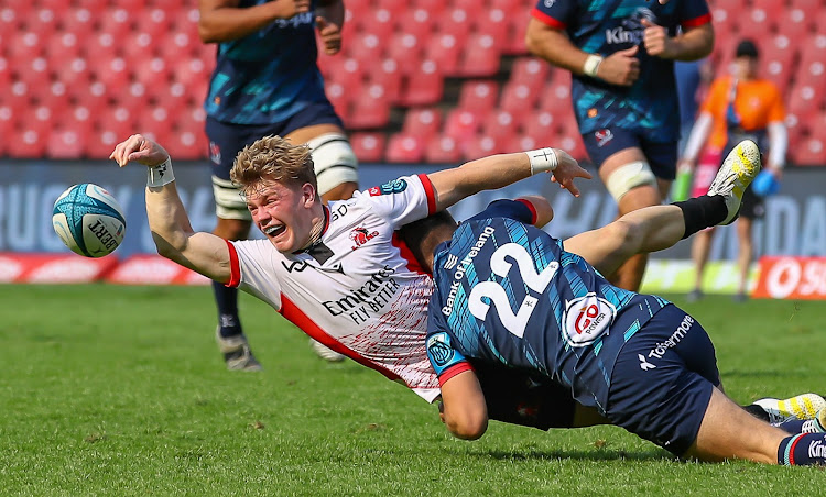 Stewart Moore of Ulster tackles Morne van den Berg of the Lions during their United Rugby Championship match at Ellis Park on Saturday.