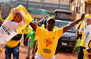 Supporters of Uganda's National Resistance Movement (NRM) party celebrate the victory of President Yoweri Museveni in the concluded general elections in Kampala, Uganda on January 16, 2021. 
