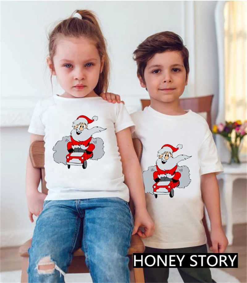 T-shirt de Noël pour enfants avec motif Père Noël et renne. Parfaite pour les fêtes de famille et amis