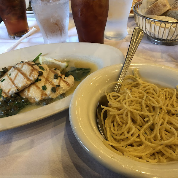 Chicken Piccata with garlic and olive oil spaghetti