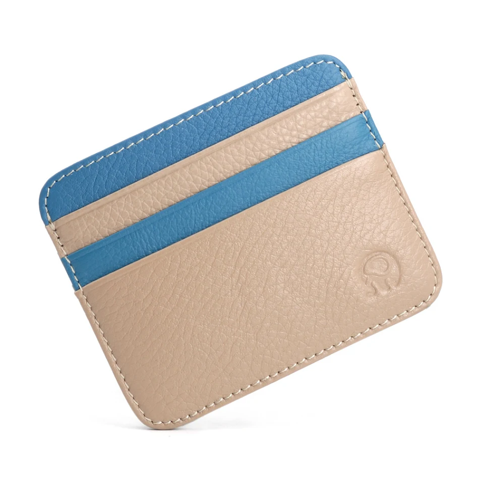 Monedero Tarjetero de Piel de Vaca de Primera Capa para Monedas y Tarjetas de Bus, Elegante y Funcional, Perfecto para el Día a Día.