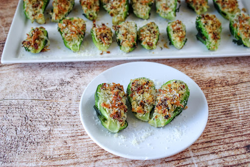 Baked Stuffed Brussels Sprouts With Bacon and Cheese on a plate.