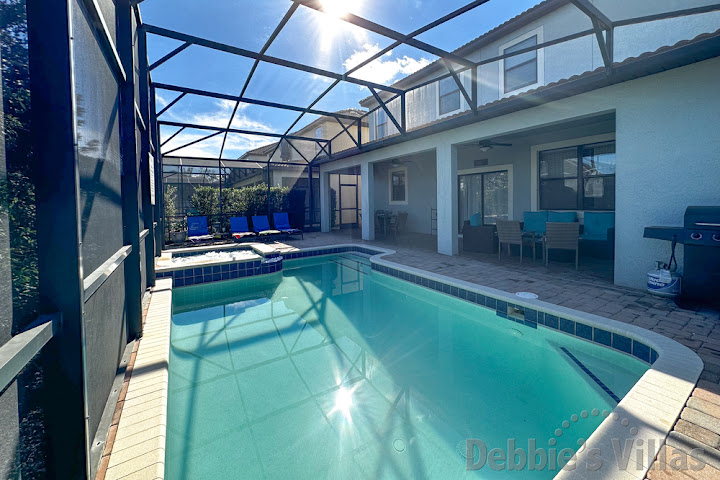 Sun drenched pool and spa at this ChampionsGate vacation villa