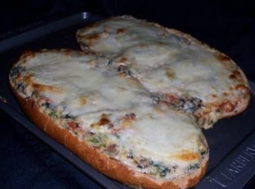 This is what it looks like with Mozzarella cheese, cooked on top, for 7 min, before taking out of the oven, (my husband prefers cheese, lots of cheese, this is the one i made tonight (04/26/12)