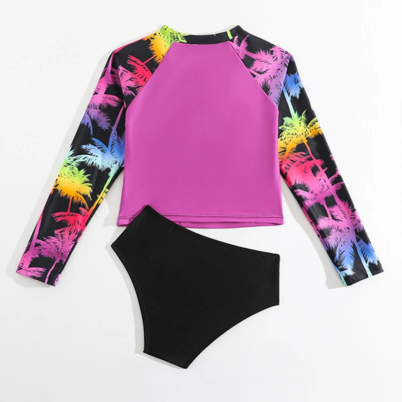 Maillot de bain enfant conservateur manches longues imprimé. Protection solaire et couvrance optimale. Idéal pour la plage et la piscine. Sécurité assurée.