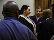 Vicki Momberg is back behind bars after handing herself over to police.