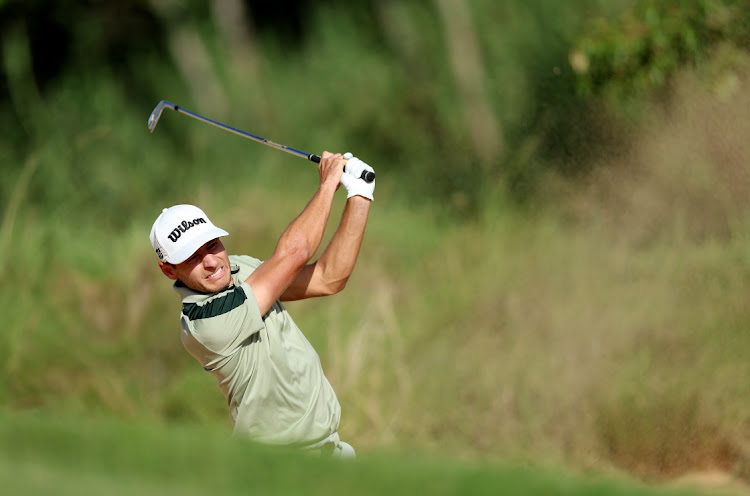 Joakim Lagergren of Sweden plays his second shot out of a bunker on the fifth hole during day one of the Investec South African Open Championship at Blair Atholl Golf & Equestrian Estate. Picture: LUKE WALKER