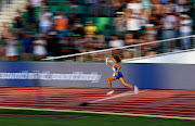 Allyson Felix of the US in action during the mixed 4x400m relay at the world championships in Eugene. 