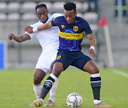 Cape Town City striker Khanyisa Mayo challenged by Onismor Bhasera of Supersport United during the DStv Premiership match at Athlone Stadium on August 21 2021 in Cape Town.