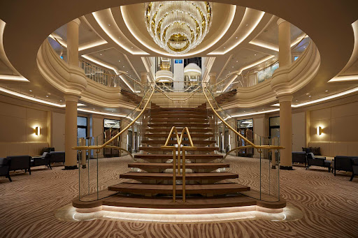 The atrium staircase of Seven Seas Splendor.