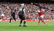 Arsenal's Bukayo Saka scores their fourth goal in their Premier League game against Crystal Palace at Emirates Stadium in London on March 19 2023.