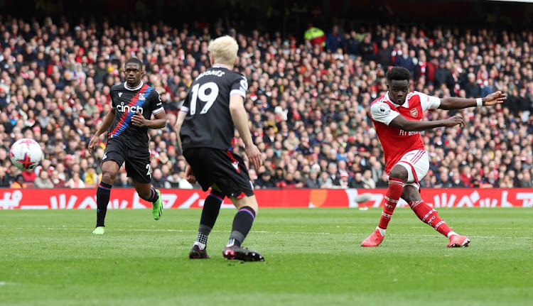 Arsenal's Bukayo Saka scores their fourth goal in their Premier League game against Crystal Palace at Emirates Stadium in London on March 19 2023.