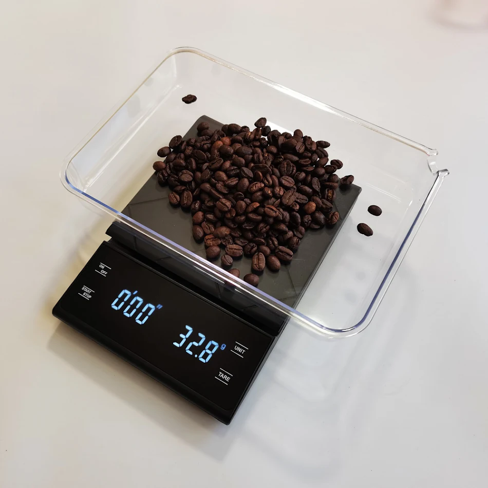 Balança Eletrônica para Café Manual. Obtenha o café perfeito com pesagem precisa e cronometragem durante a extração. Ideal para barista.