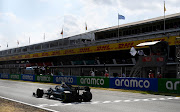 Race winner Lewis Hamilton of Great Britain driving the (44) Mercedes AMG Petronas F1 Team Mercedes W11 crosses the finish line during the F1 Grand Prix of Spain at Circuit de Barcelona-Catalunya on August 16, 2020 in Barcelona, Spain.