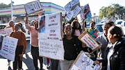 About 50 women from Du Noon protested outside the Wynberg magistrate's court in Cape Town on June 6 2022, demanding no bail for suspects in the Abongile Mafalala murder case. Mafalala was stoned, beaten and set alight by a mob that wrongly believed he had abducted a child in Parkwood.