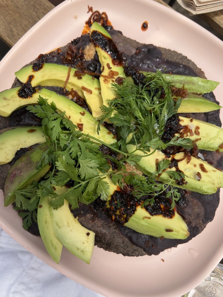 Black bean avocado tlayudita. Incredibly flavorful!