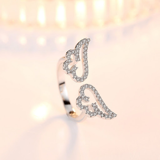 Title 4, 925 Silver Angel Wings Adjustable Ring A beauti...