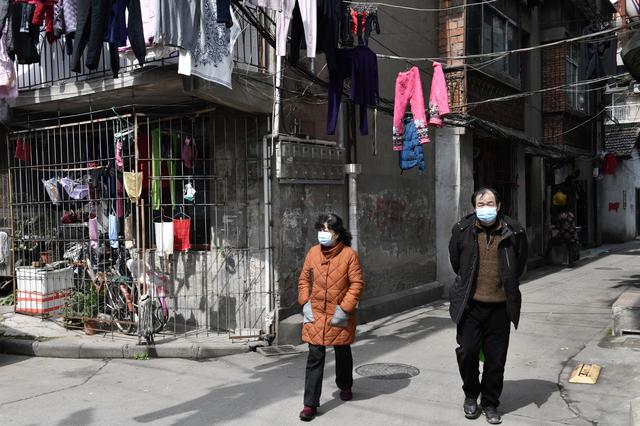 People wearing protective face masks in Hubei province of China on March 4.