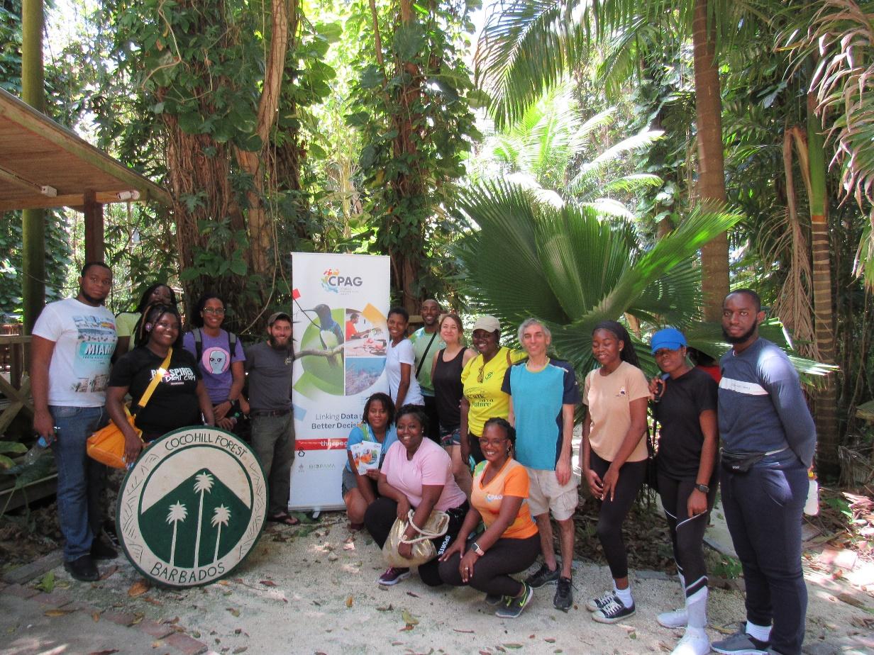 A group of people posing for a photo

Description automatically generated