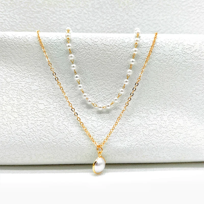 Collier pendentif perle simple et élégant pour femmes, style coréen, un bijou délicat pour sublimer votre look quotidien et ajouter une touche de raffinement.